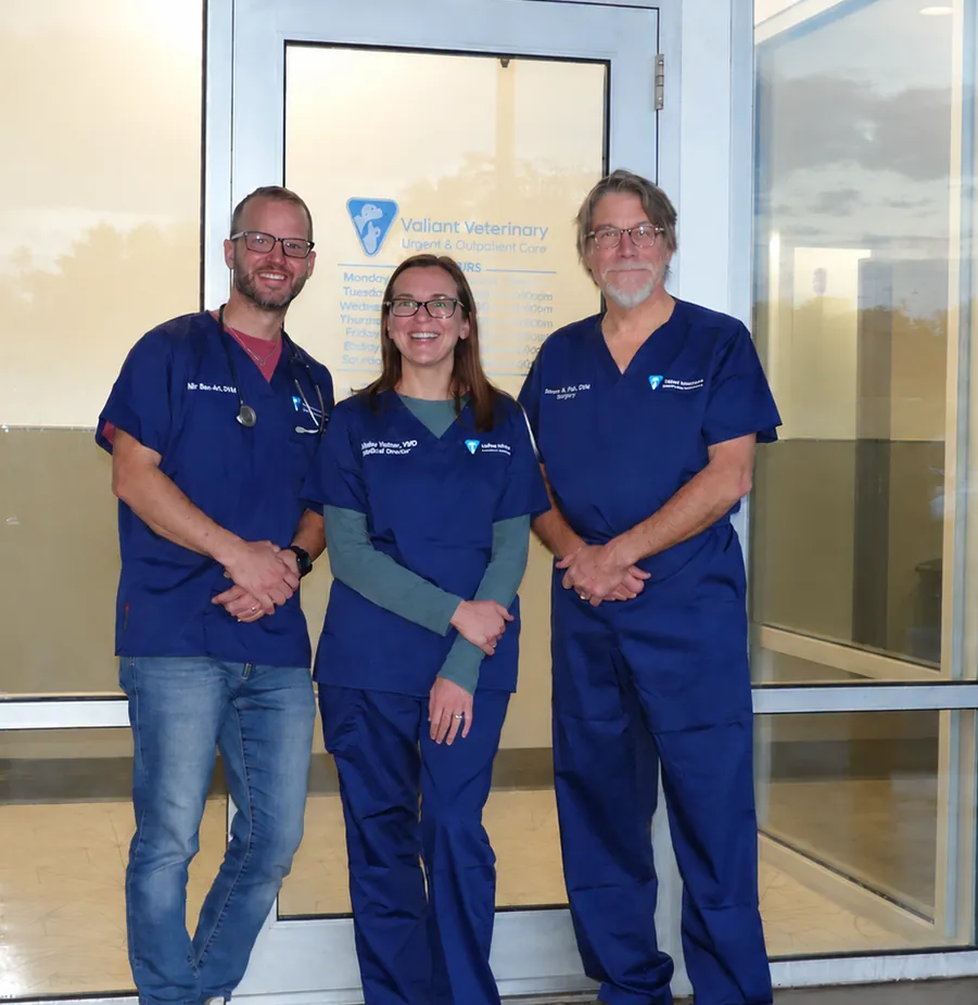 The owners of Valiant Veterinary standing outside the clinic entrance